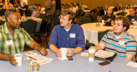 People talking at Carolina Technology Consultants Retreat fall 2014