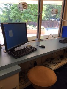 "dumb" computer terminal at ticket office desk