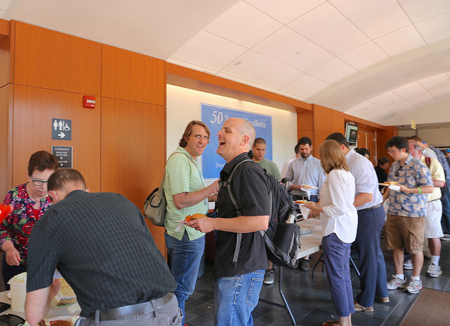Attendees stand in BarCamp 2017cookout food line