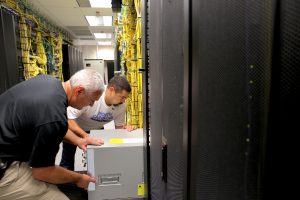 ITS staffers install a new Cisco Nexus at ITS Franklin.