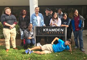ResNet staff pose at Kramden sign