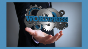 illustration of hand holding word "WordPress" and gears