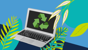 A laptop displays the recycle symbol and is surrounded by green leaves