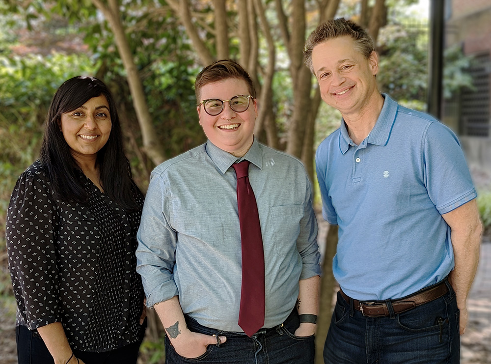 The three new consultants, Sherose Badruddin, Lane Fields, and Craig Hayward smile in a group photo